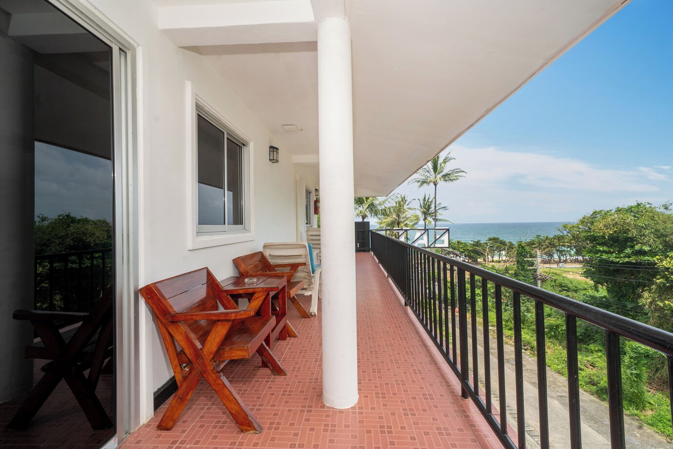 Authentic Oceanview Bungalows white garden building and terraced paths